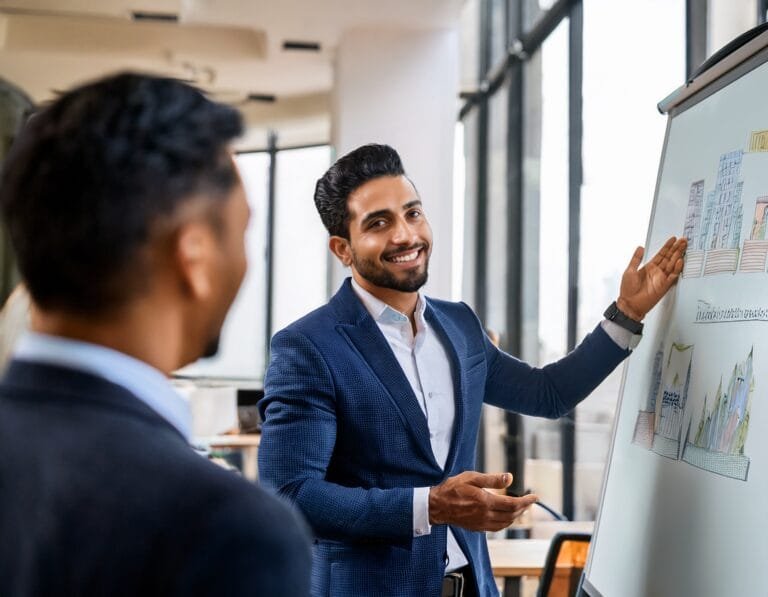 Professional HR training session at FIT Institute in Dubai. An instructor leads a group of students in a KHDA-accredited HR diploma course, focusing on recruitment, employee relations, and performance management in a modern classroom setting